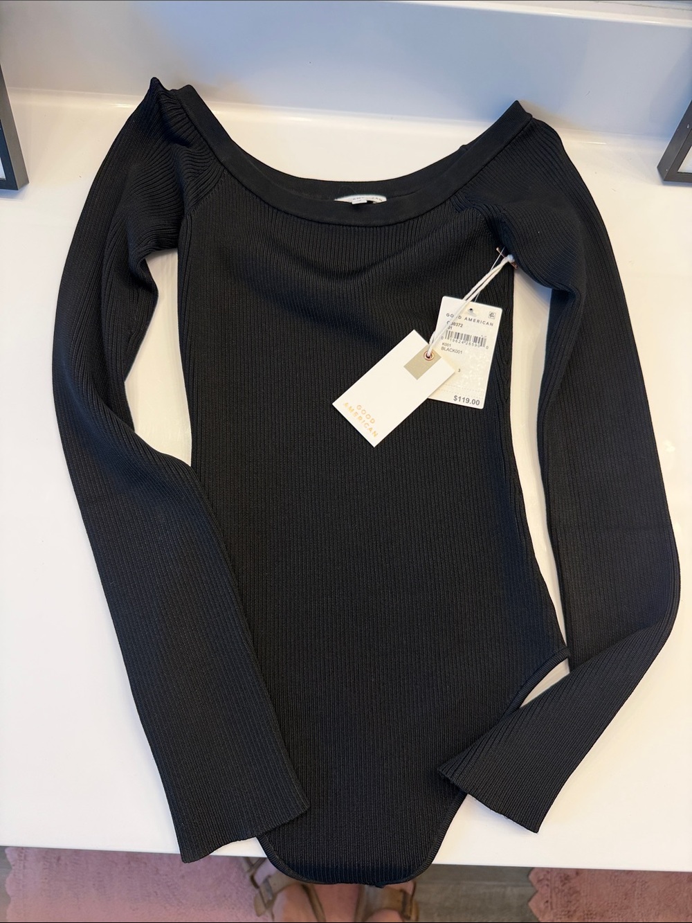 Never worn tags in Good American Ribbed Black Long Sleeve Bodysuit
